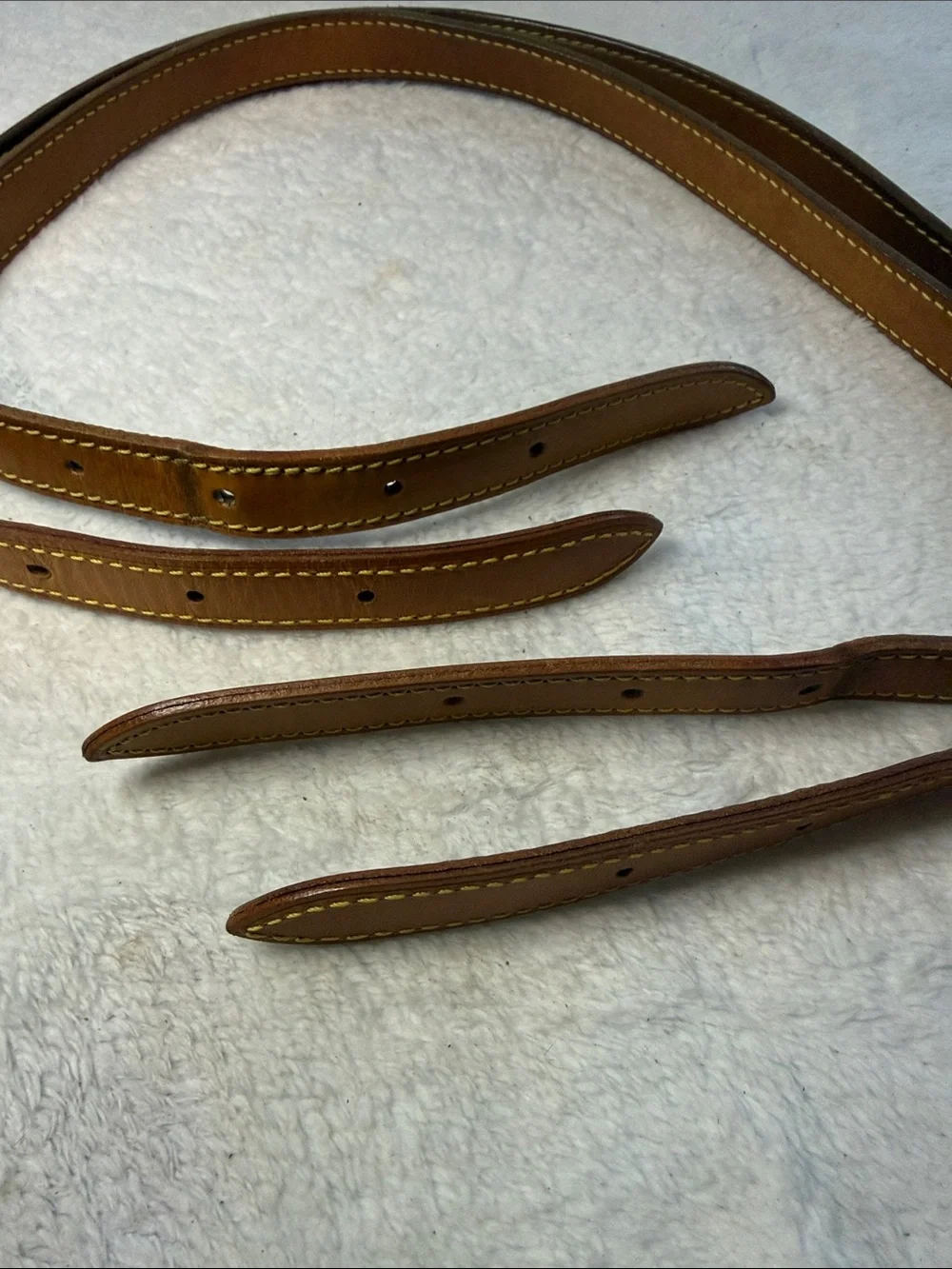 1 set of Louis Vuitton leather straps